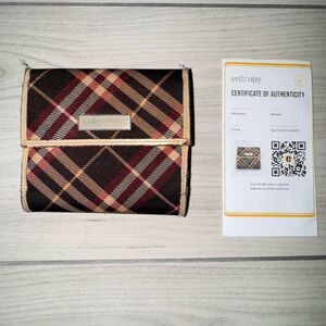 Burberry Blue Label tri-fold wallet in‎ a burgundy and tan plaid pattern